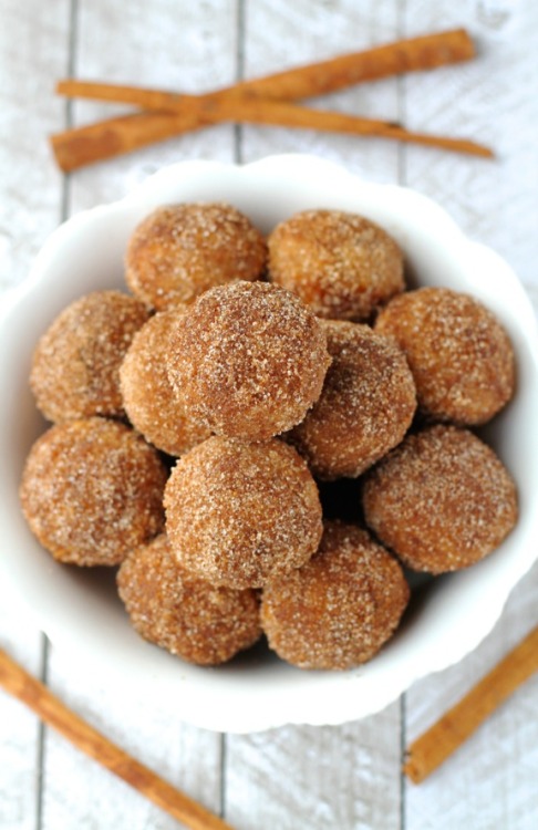 Baked Snickerdoodle Donut Hole Running with Spoons
